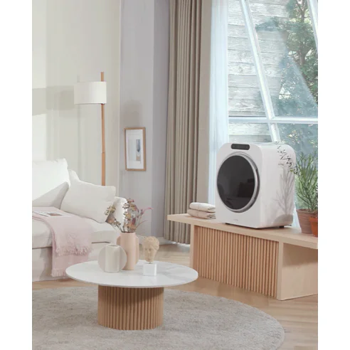 거실 인테리어와 함께 어우러진 미니 건조기